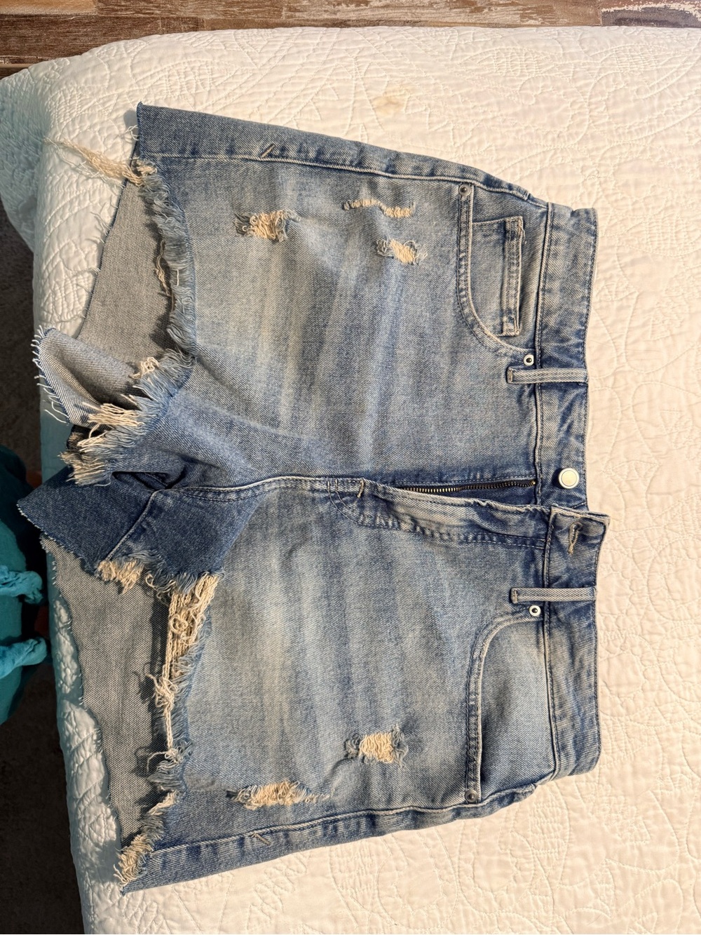 Good American Faded Blue Distressed Denim Shorts